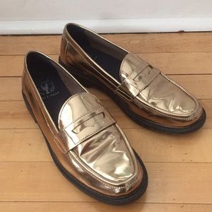Cole Haan gold penny loafers